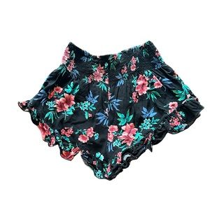 Super cute Hollister black floral ruffle elastic waistband shorts size medium.